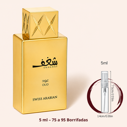 Swiss Arabian Shaghaf Oud — frasco dourado ao lado de um decant spray de 5 ml, para comparar o tamanho; cerca de 75 a 95 borrifadas