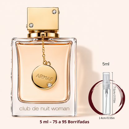 Armaf Club de Nuit Woman — frasco com pingente ao lado de um decant spray de 5 ml, para comparar o tamanho; cerca de 75 a 95 borrifadas