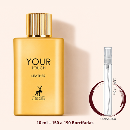 Maison Alhambra Your Touch Leather — frasco dourado ao lado de um decant spray de 10 ml, para comparar o tamanho; cerca de 150 a 190 borrifadas